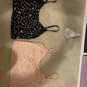 2 tops with white flowers dark blue and light pink